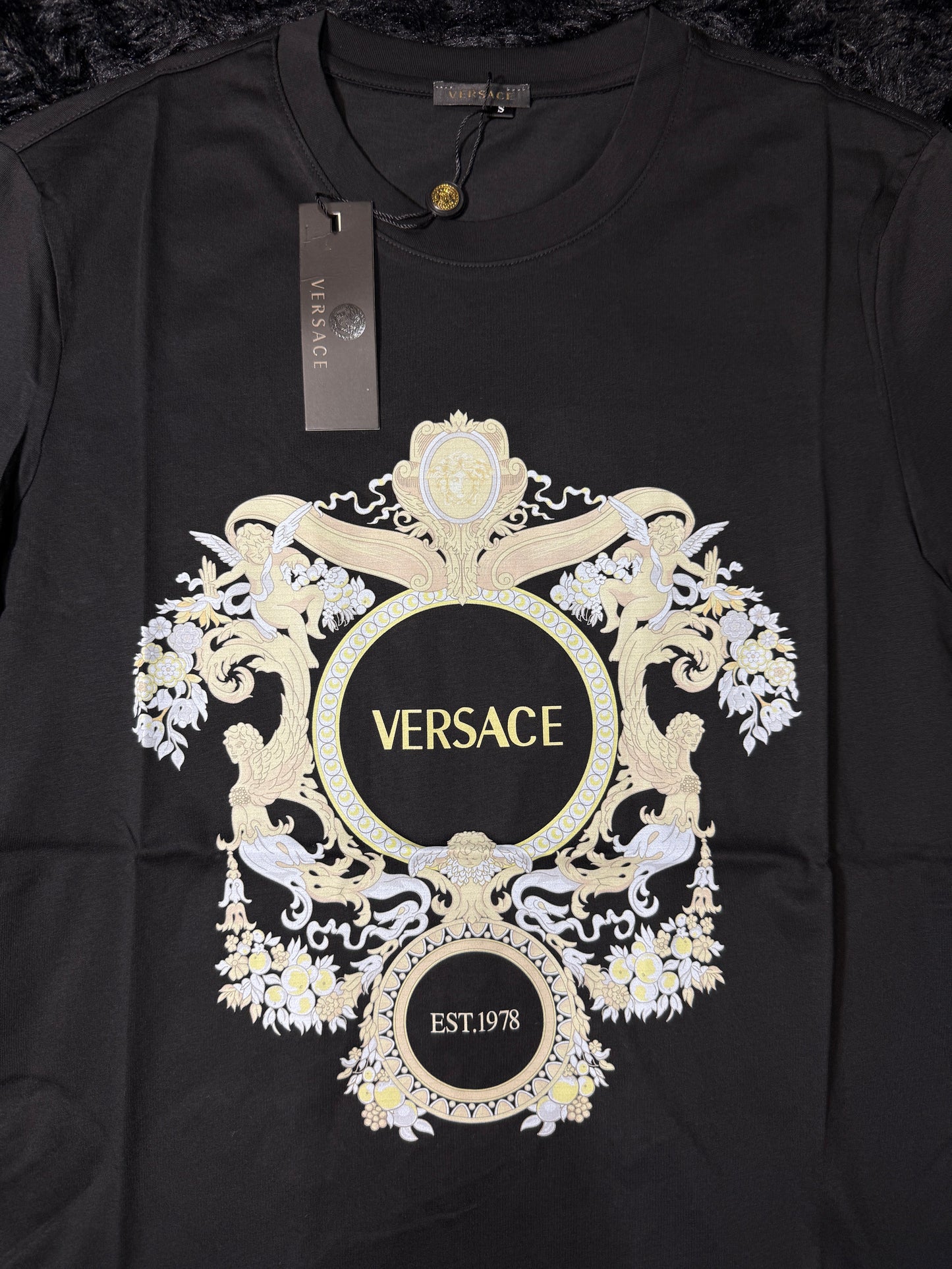 VERSAC€ T